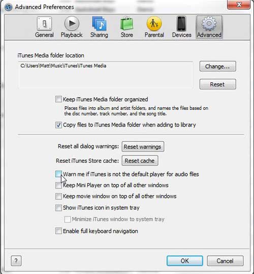 clear the check box to stop the default iTunes player prompt