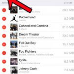 tap the red circle next to all songs
