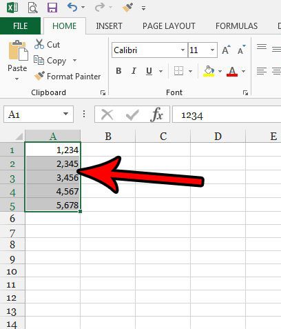 select the cells with commas in numbers