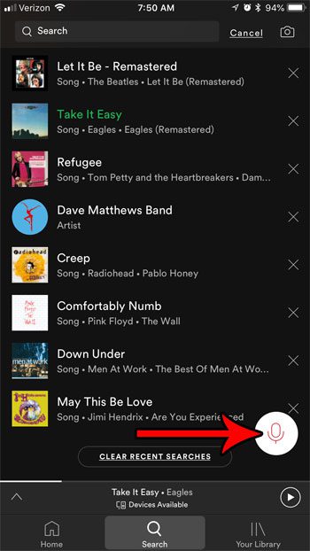 the voice search button in the spotify iphone app