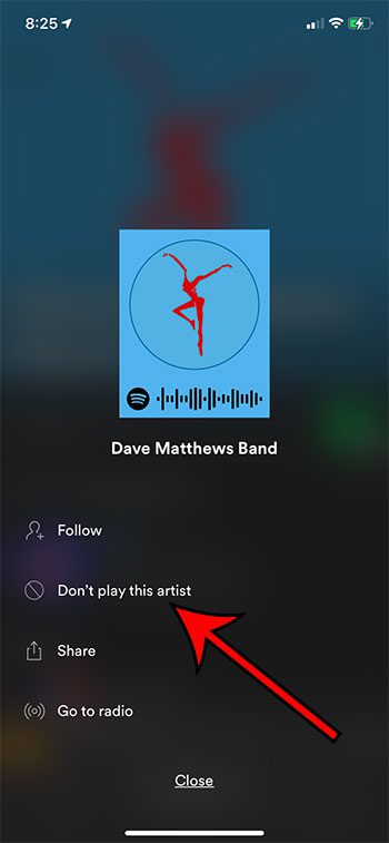 how to stop playing songs from an artist in Spotify on iPhone