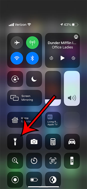 tap and hold on the iPhone flashlight button
